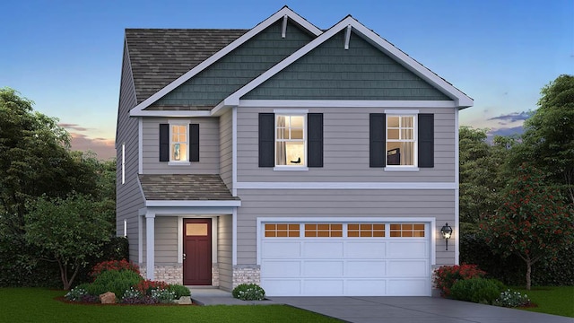 5025 Yates Dr, Mount Pleasant, WI 53403 - view of front facade with driveway, an attached garage, stone siding, and a shingled roof