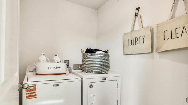 5025 Yates Dr, Mount Pleasant, WI 53403 - washroom with washing machine and dryer