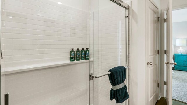 5025 Yates Dr, Mount Pleasant, WI 53403 - bathroom with a stall shower