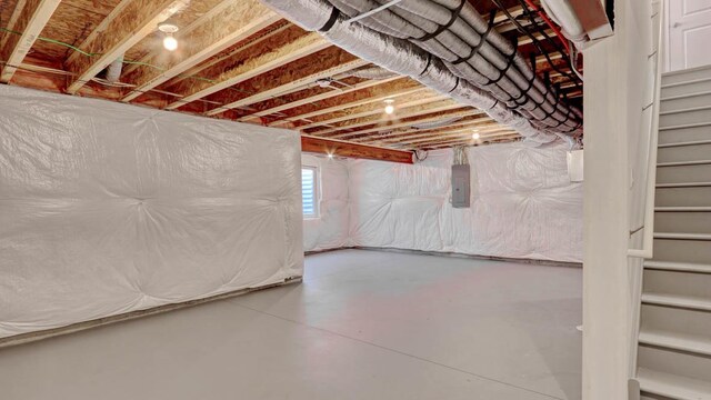 5025 Yates Dr, Mount Pleasant, WI 53403 - basement with electric panel and stairs