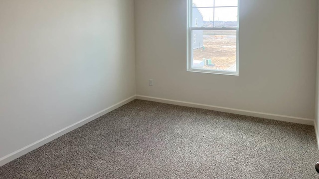 5025 Yates Dr, Mount Pleasant, WI 53403 - carpeted empty room featuring baseboards