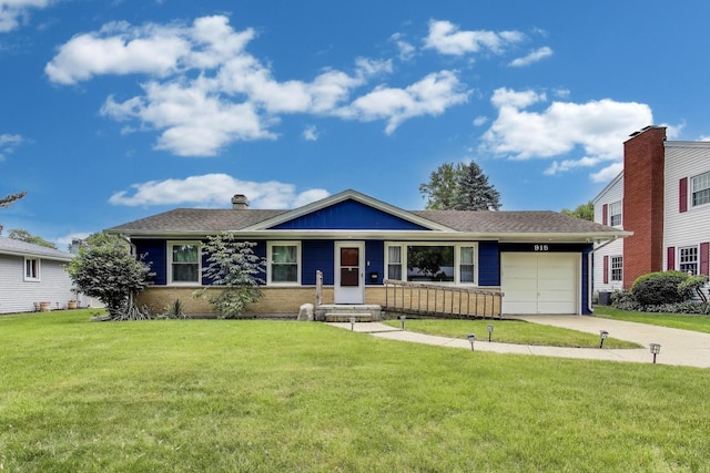 915 Carol Ave, Elgin, IL 60123 - ranch-style home with an attached garage, driveway, a front lawn, and a shingled roof