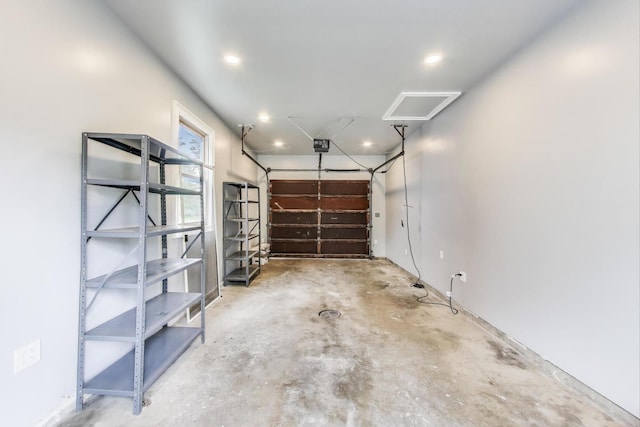 915 Carol Ave, Elgin, IL 60123 - garage with recessed lighting and a garage door opener