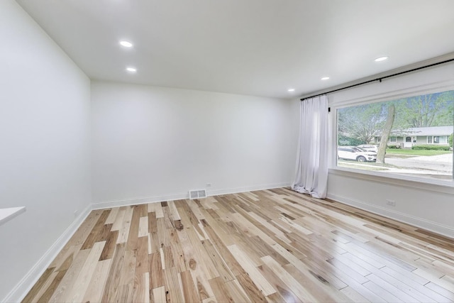 915 Carol Ave, Elgin, IL 60123 - empty room with light wood-type flooring and recessed lighting