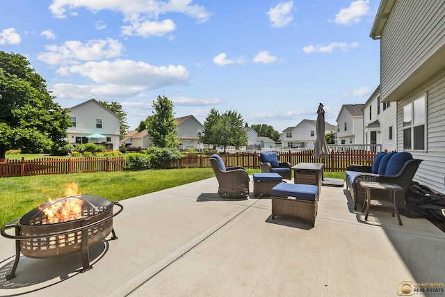1878 Grassy Knoll Ct, Romeoville, IL 60446 - fenced backyard with a residential view, a patio area, and an outdoor living space with a fire pit