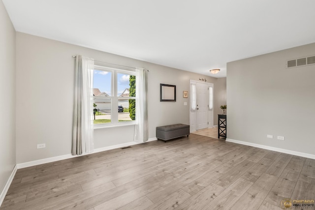 1878 Grassy Knoll Ct, Romeoville, IL 60446 - spare room featuring wood finished floors and baseboards