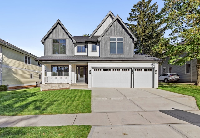 425 Sherman St, Downers Grove, IL 60515 - craftsman-style house with covered porch, a front yard, concrete driveway, and a garage