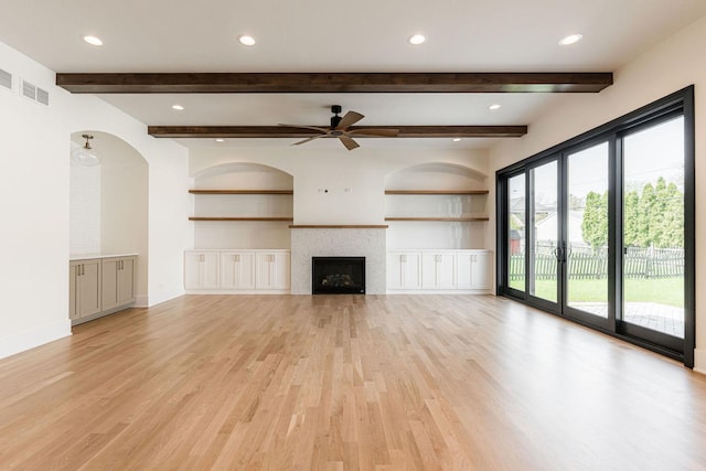 425 Sherman St, Downers Grove, IL 60515 - unfurnished living room featuring light wood-style flooring, a ceiling fan, a fireplace, recessed lighting, and beamed ceiling