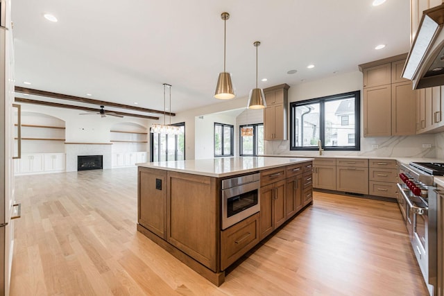 425 Sherman St, Downers Grove, IL 60515 - kitchen with double oven range, ceiling fan, backsplash, light wood-type flooring, and recessed lighting