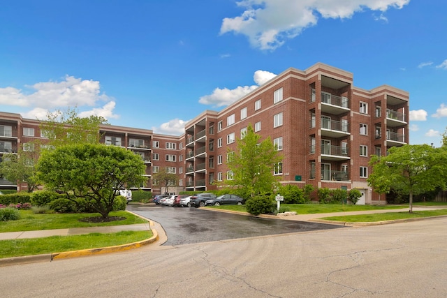 5360 N Lowell Ave Unit 502, Chicago, IL 60630 - view of apartment building / complex with uncovered parking