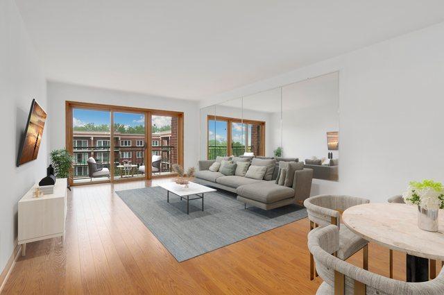 5360 N Lowell Ave Unit 502, Chicago, IL 60630 - living room featuring wood finished floors and baseboards