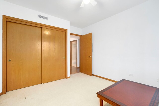 5360 N Lowell Ave Unit 502, Chicago, IL 60630 - bedroom featuring light colored carpet, a closet, and a ceiling fan