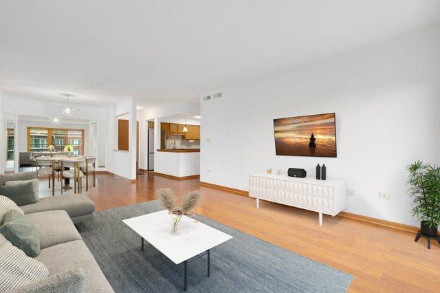 5360 N Lowell Ave Unit 502, Chicago, IL 60630 - living room with wood finished floors