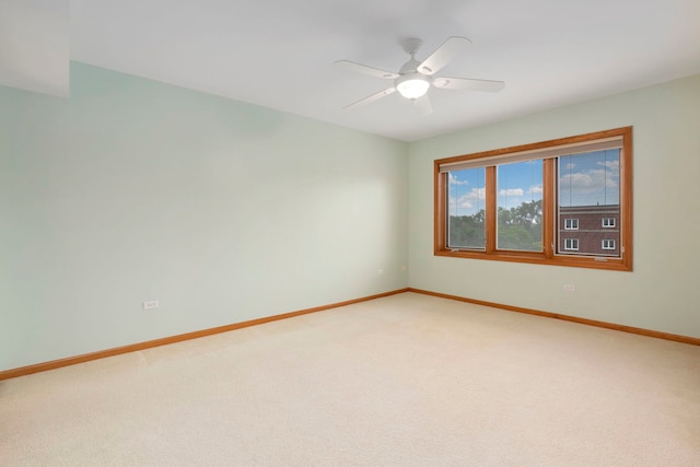5360 N Lowell Ave Unit 502, Chicago, IL 60630 - empty room with light colored carpet and ceiling fan
