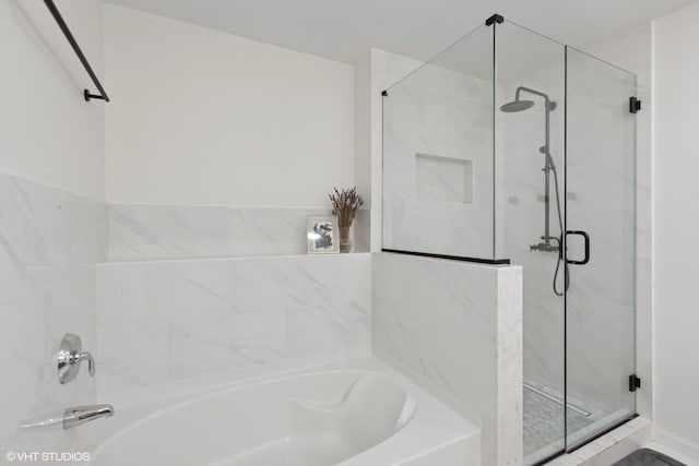 5530 Cambridge Way, Hanover Park, IL 60133 - bathroom featuring a garden tub and a stall shower