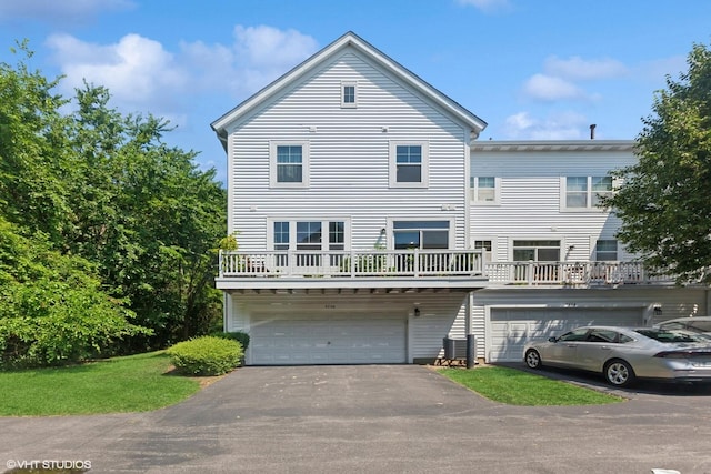 5530 Cambridge Way, Hanover Park, IL 60133 - view of front facade with asphalt driveway and a garage