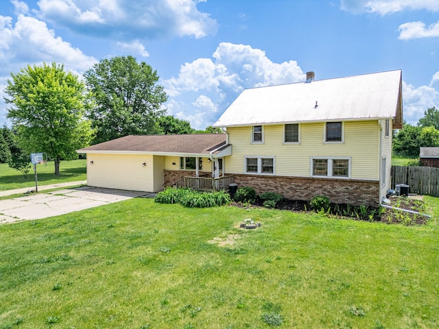 6422 Steward Rd, Rockford, IL 61101 - view of front of property with concrete driveway, brick siding, and an attached garage