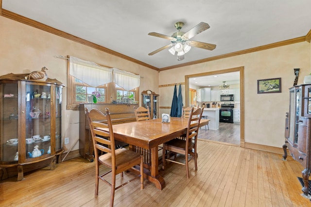 6422 Steward Rd, Rockford, IL 61101 - dining area with light wood finished floors, a ceiling fan, and ornamental molding