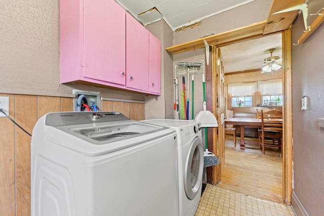 6422 Steward Rd, Rockford, IL 61101 - washroom featuring cabinet space, washer and clothes dryer, ceiling fan, and light flooring