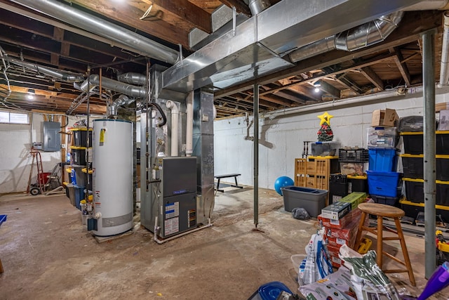 6422 Steward Rd, Rockford, IL 61101 - below grade area featuring gas water heater, heating unit, and electric panel
