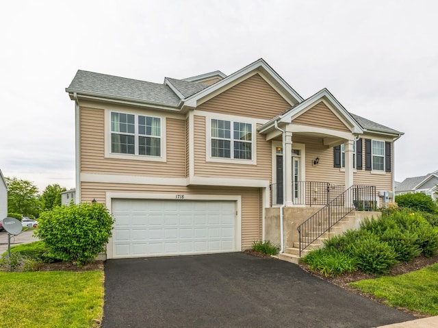 1718 Windward Dr, Pingree Grove, IL 60140 - view of front of house with an attached garage, asphalt driveway, and a shingled roof