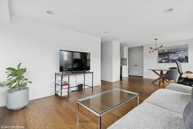 247 E Chestnut St Unit 2504, Chicago, IL 60611 - living area with a chandelier, wood finished floors, and recessed lighting