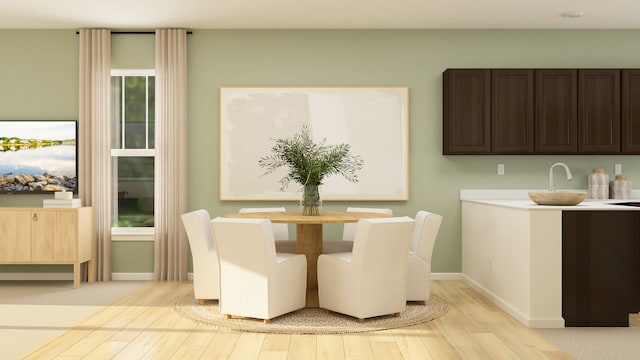 2109 Neubauer Cir, Lindenhurst, IL 60046 - dining room featuring light wood-type flooring and baseboards