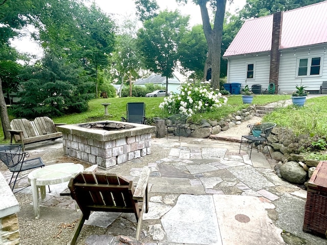 825 Swift Ave, Oglesby, IL 61348 - view of patio / terrace with an outdoor fire pit