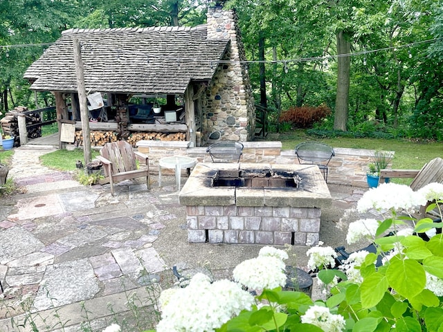 825 Swift Ave, Oglesby, IL 61348 - view of patio / terrace with an outdoor fire pit