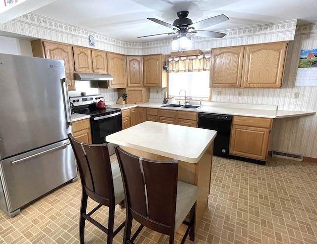 825 Swift Ave, Oglesby, IL 61348 - kitchen featuring freestanding refrigerator, black dishwasher, electric range oven, under cabinet range hood, and wallpapered walls