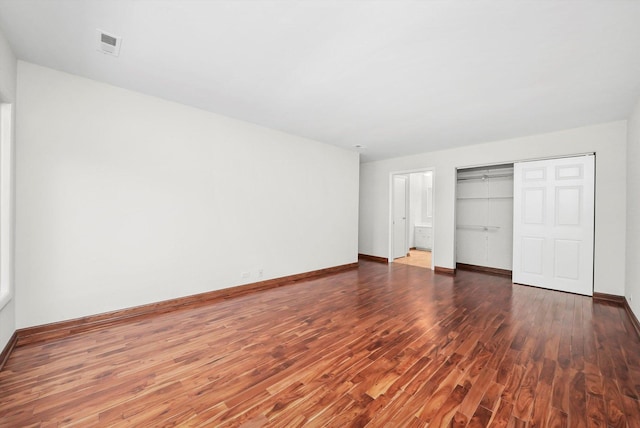 77 Lake Hinsdale Dr Unit 207, Willowbrook, IL 60527 - unfurnished bedroom with wood finished floors and a closet