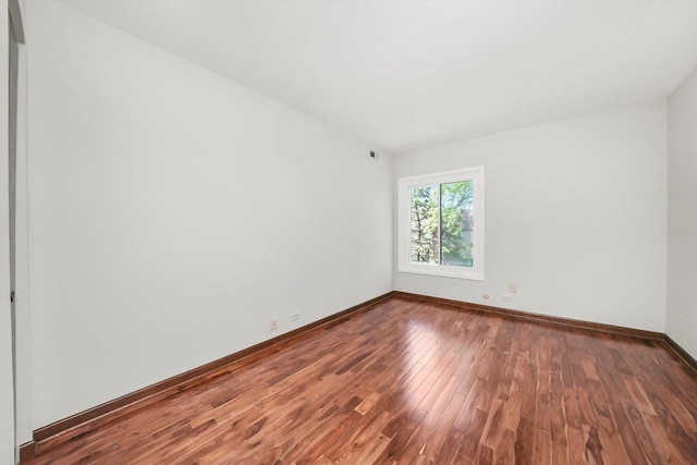 77 Lake Hinsdale Dr Unit 207, Willowbrook, IL 60527 - empty room with wood finished floors and baseboards