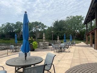 77 Lake Hinsdale Dr Unit 207, Willowbrook, IL 60527 - view of patio / terrace with outdoor dining space