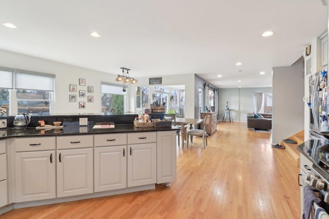 644 N Franklin Ave, Palatine, IL 60067 - kitchen with light wood-style flooring, recessed lighting, white cabinetry, open floor plan, and electric range