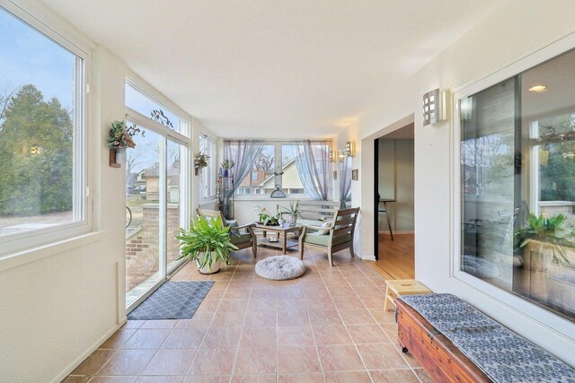 644 N Franklin Ave, Palatine, IL 60067 - sunroom / solarium featuring baseboards