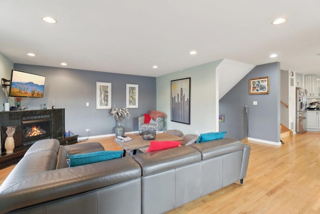 644 N Franklin Ave, Palatine, IL 60067 - living area featuring recessed lighting, light wood-type flooring, stairway, and a fireplace