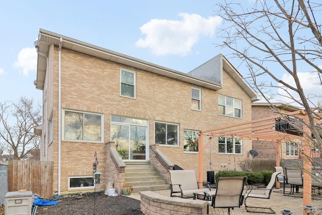 644 N Franklin Ave, Palatine, IL 60067 - rear view of house featuring brick siding, a pergola, and a patio area