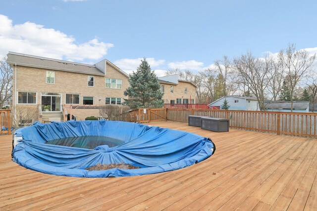 644 N Franklin Ave, Palatine, IL 60067 - wooden deck with a covered pool