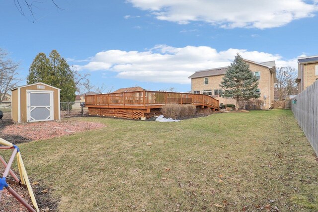 644 N Franklin Ave, Palatine, IL 60067 - fenced backyard featuring a wooden deck and a storage unit