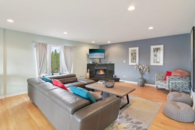 644 N Franklin Ave, Palatine, IL 60067 - living room with light wood finished floors, recessed lighting, and a lit fireplace