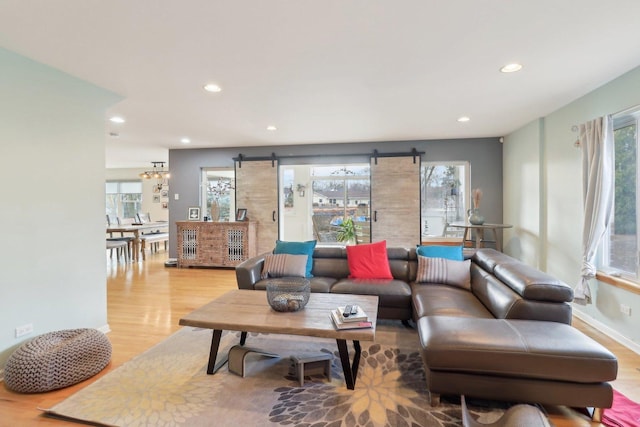 644 N Franklin Ave, Palatine, IL 60067 - living room featuring a barn door, light wood-type flooring, and recessed lighting
