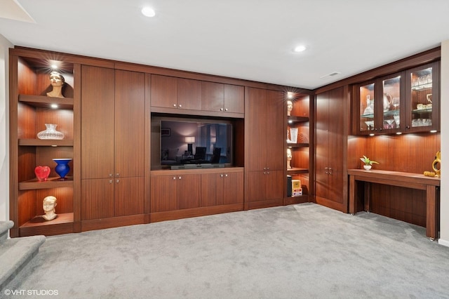 1327 N Sutton Pl, Chicago, IL 60610 - unfurnished living room with carpet floors, recessed lighting, and built in features