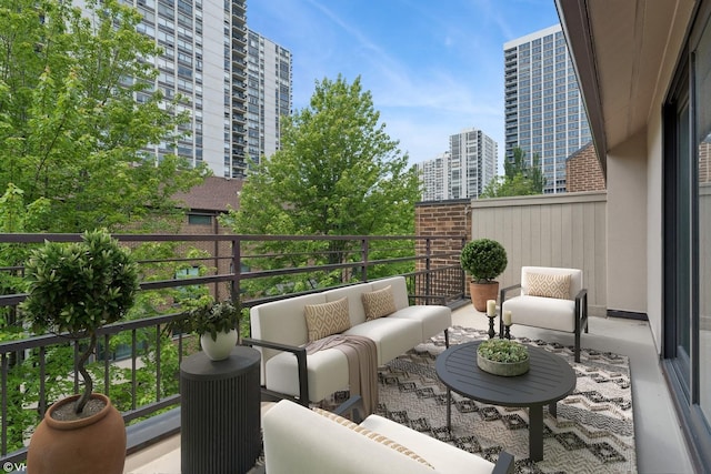 1327 N Sutton Pl, Chicago, IL 60610 - balcony with outdoor lounge area and a view of city