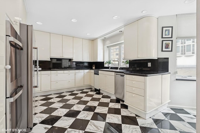 1327 N Sutton Pl, Chicago, IL 60610 - kitchen with dishwasher, decorative backsplash, dark countertops, recessed lighting, and gas cooktop