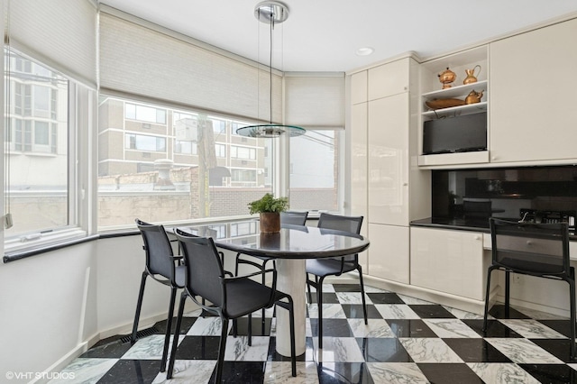 1327 N Sutton Pl, Chicago, IL 60610 - dining space with baseboards