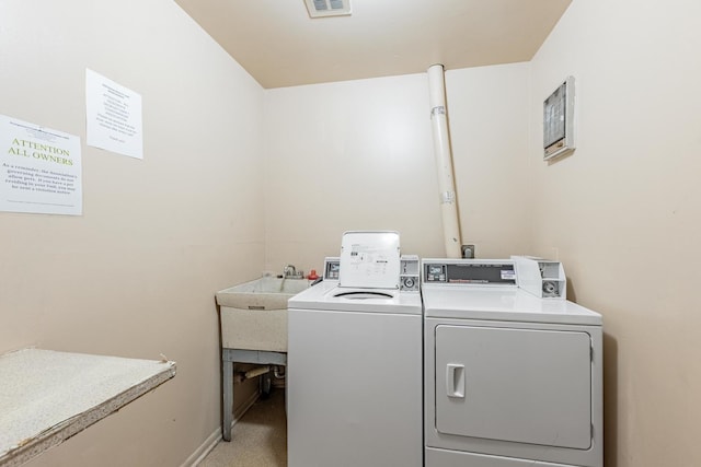 6135 W 94th St Unit A1, Oak Lawn, IL 60453 - community laundry with washer and clothes dryer and light colored carpet