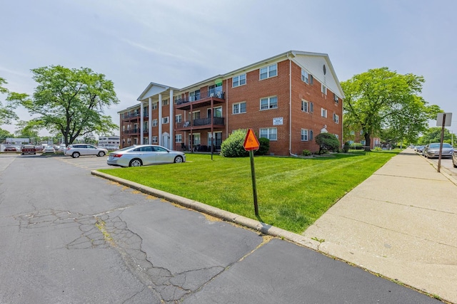 6135 W 94th St Unit A1, Oak Lawn, IL 60453 - view of apartment building / complex featuring uncovered parking