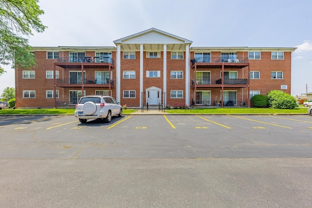 6135 W 94th St Unit A1, Oak Lawn, IL 60453 - view of apartment building / complex with uncovered parking