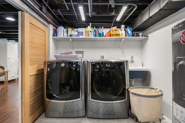 637 Highland Ave, Oak Park, IL 60304 - washroom featuring washing machine and dryer and wood finished floors