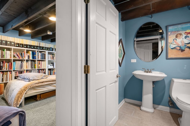 637 Highland Ave, Oak Park, IL 60304 - half bath featuring beamed ceiling and tile patterned floors